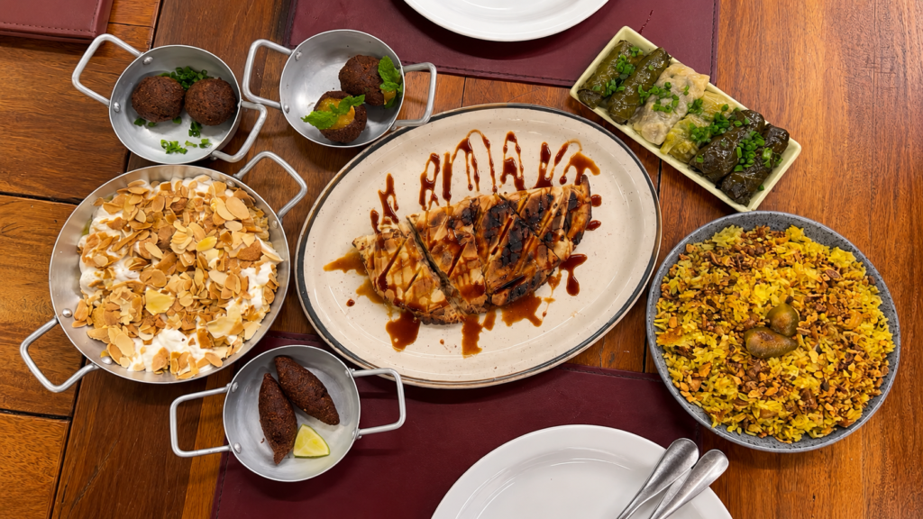 Kibe, falafel, arais e três tipos de charuto